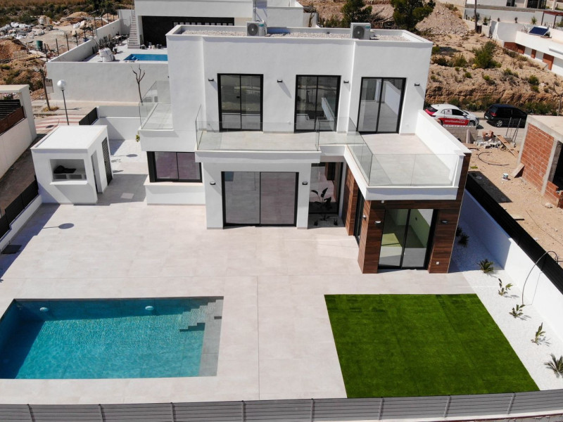 Obra nueva de chalets de estilo moderno en Polop de la Marina en Polop (Revista) photo 2