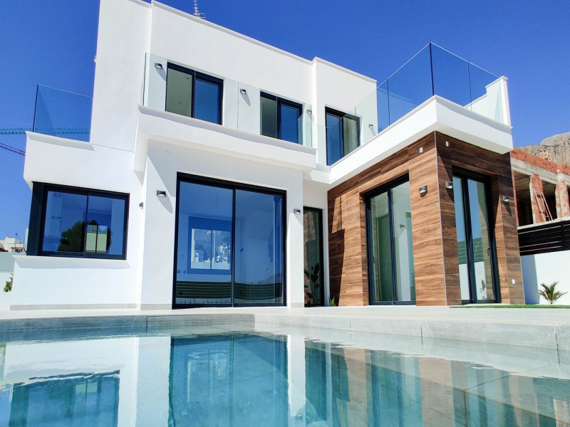 Obra nueva de chalets de estilo moderno en Polop de la Marina en Polop (Revista) photo 4
