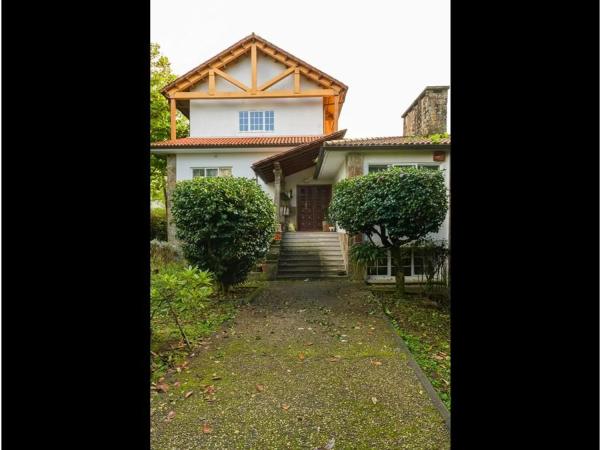Chalet independiente en venta en  Camino Paraxo, Ames photo 1
