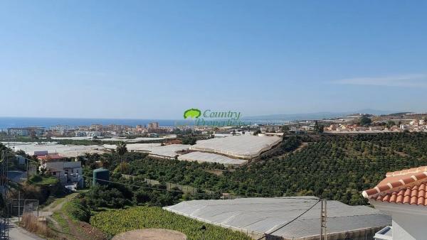Коттедж на продажу в Urbanización Santa Rosa, Torrox thumbnail 1