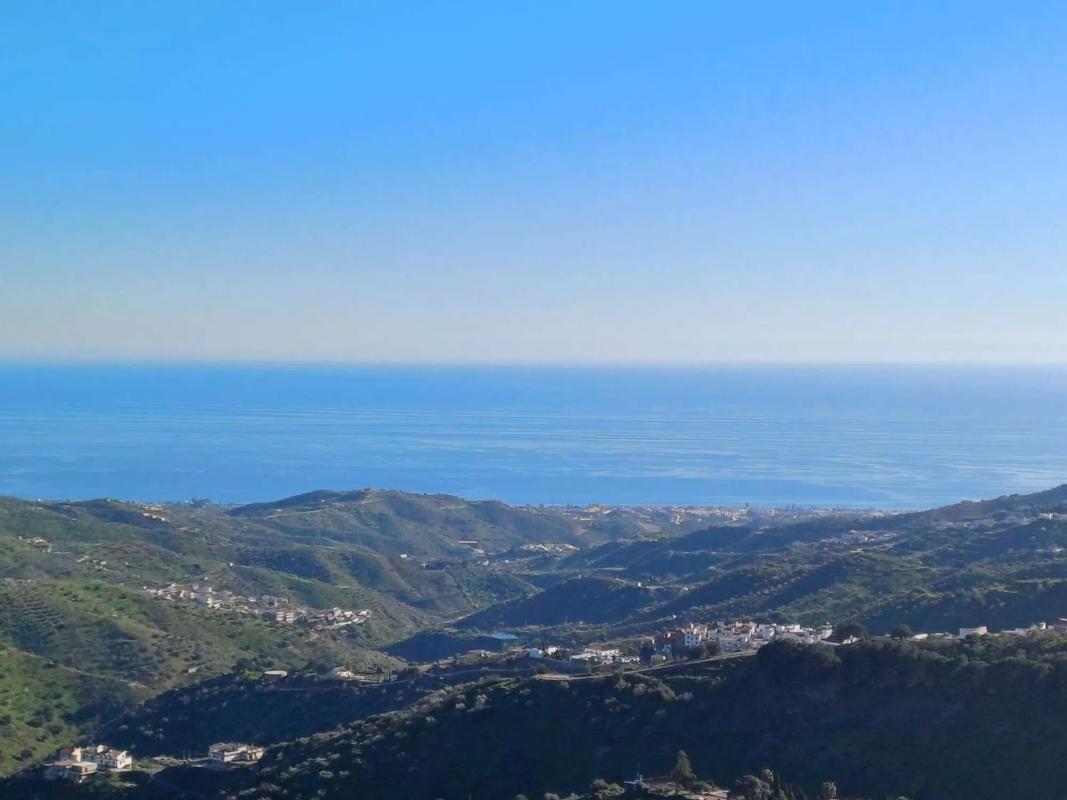 Terreno en venta en Moclinejo, Malaga photo 1