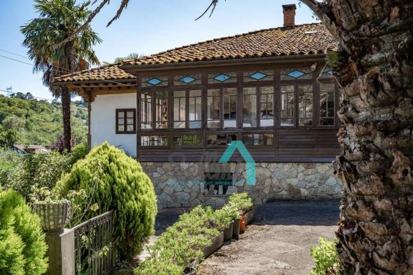 Casa independiente en calle Rozas photo 1