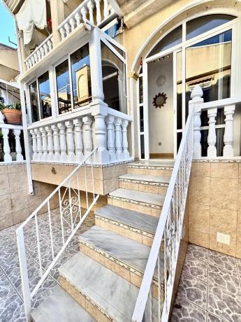 Chalet adosado en calle Pomelo photo 1