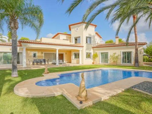 Chalet wolnostojący na sprzedaż w  Cala Advocat - Baladrar, Benissa photo 1