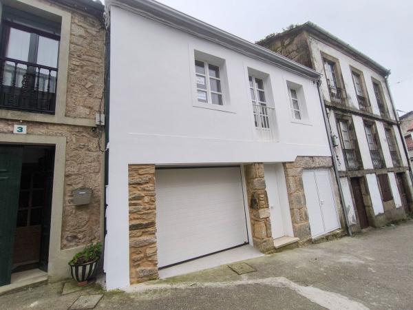 Chalet adosado en cornes photo 3