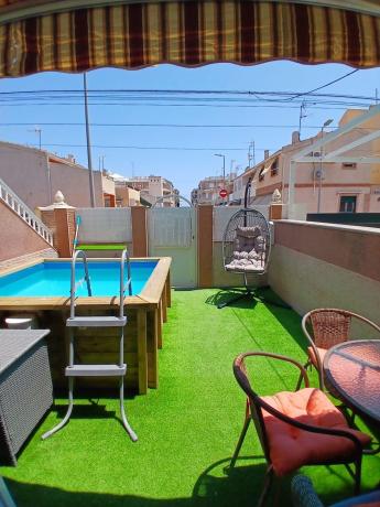 Chalet adosado en Maestro Quino, Playa de los Náufragos, Torrevieja photo 1