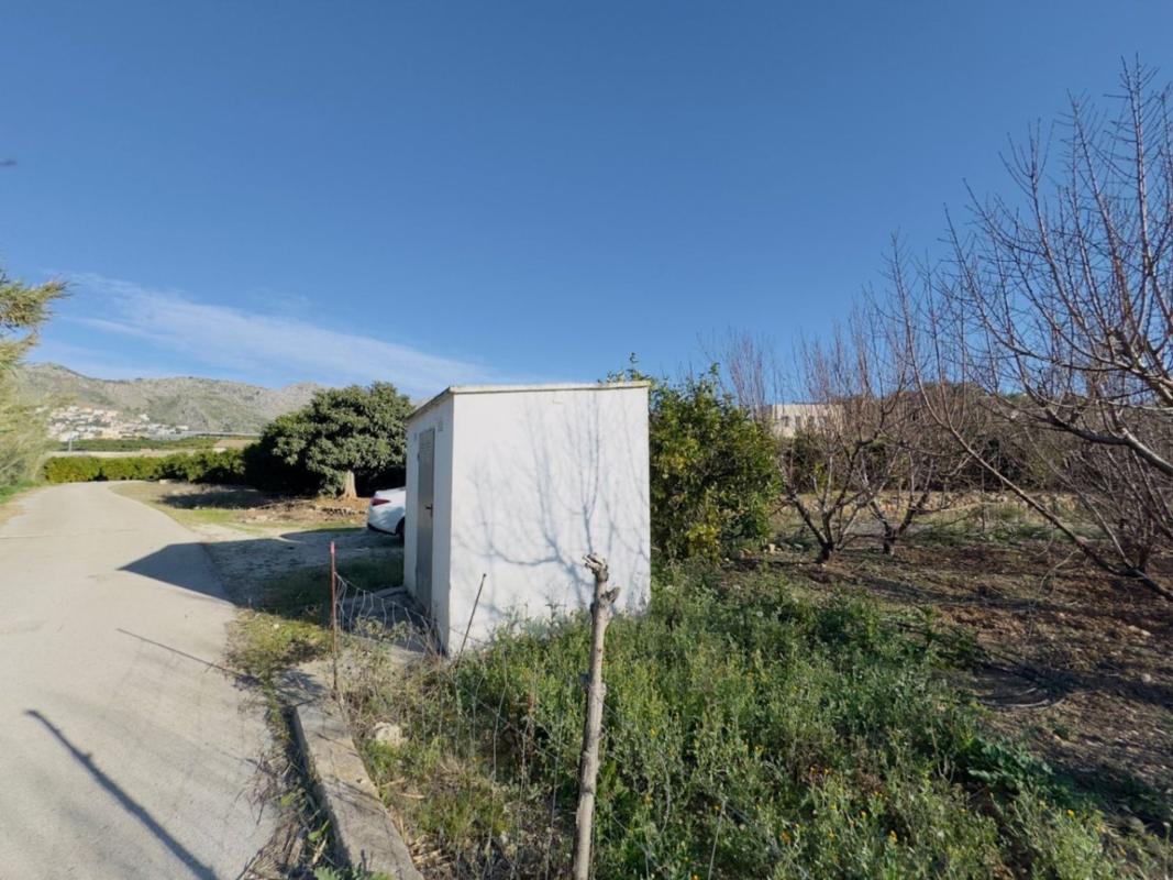Продажа загородного участка в Finca rústica en Beniarbeig , Бениарбек photo 1