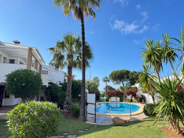 Chalet adosado en Les Rotes/Las Rotas, Denia photo 1