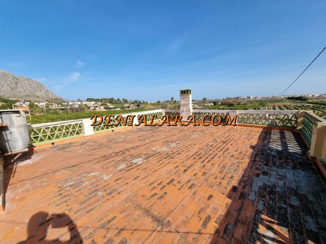 Продажа загородного участка в Finca rústica en Beniarbeig , Бениарбек photo 4