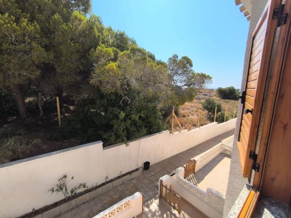 Chalet adosado en Calle Jazmines, Playa Flamenca, Orihuela photo 1