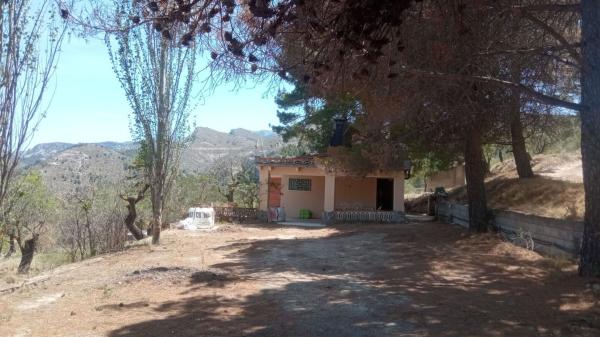 Частный шале на продаже в Casa o chalet independiente en Confrides, Конфридес photo 1