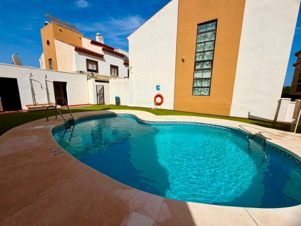 Chalet adosado en Calle Alfonso de la Torre MarÍn, El Cuartón - Heliomar, Málaga photo 1