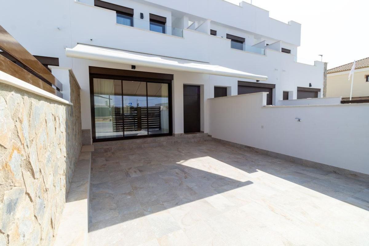 Продажа таунхауса в Chalet adosado en Cristo Crucificado, 32, Zona Pueblo, Pilar de la Horadada , Пилар де ла Орадада photo 1