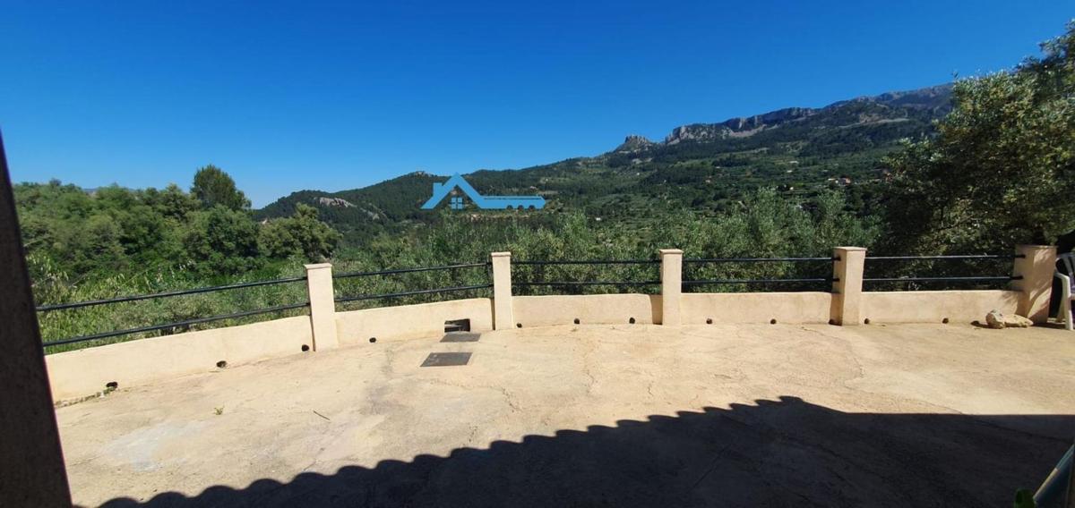Продажа загородного участка в  Finca rústica en Confrides , Конфридес photo 5