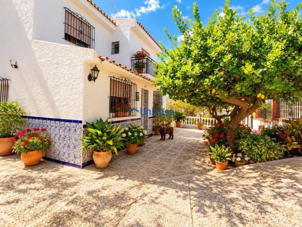 Casa o chalet independiente en Calle Escritor Bravo y Zúñiga, Fuente Alegre - El Chaparral - Los Morales, Málaga photo 1